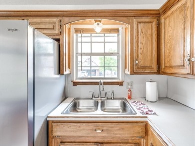 Welcome to this beautifully maintained 4-bedroom, 2-bath home on Earlywine Golf Course in Oklahoma - for sale on GolfHomes.com, golf home, golf lot