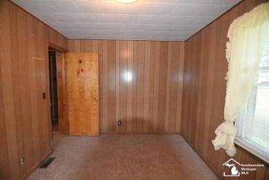 Discover the potential of this 2/3-bedroom ranch home situated on Dundee Golf Club in Michigan - for sale on GolfHomes.com, golf home, golf lot