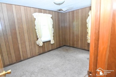 Discover the potential of this 2/3-bedroom ranch home situated on Dundee Golf Club in Michigan - for sale on GolfHomes.com, golf home, golf lot