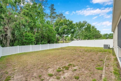 Conservation Lot. Furnished. Front Pond View. Single-story home on Meadow Oaks Golf and Country Club in Florida - for sale on GolfHomes.com, golf home, golf lot