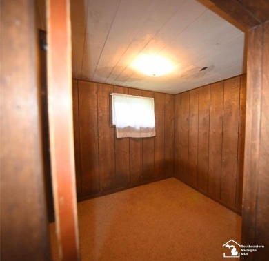 Discover the potential of this 2/3-bedroom ranch home situated on Dundee Golf Club in Michigan - for sale on GolfHomes.com, golf home, golf lot