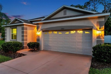 Conservation Lot. Furnished. Front Pond View. Single-story home on Meadow Oaks Golf and Country Club in Florida - for sale on GolfHomes.com, golf home, golf lot