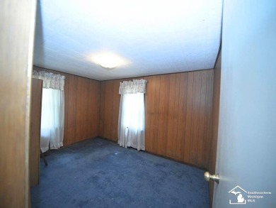 Discover the potential of this 2/3-bedroom ranch home situated on Dundee Golf Club in Michigan - for sale on GolfHomes.com, golf home, golf lot