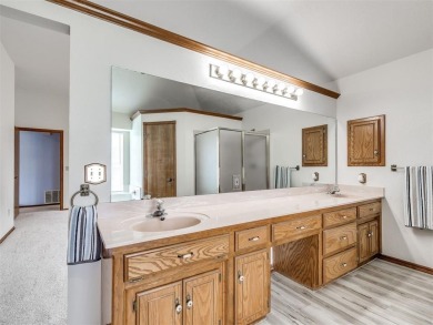 Welcome to this beautifully maintained 4-bedroom, 2-bath home on Earlywine Golf Course in Oklahoma - for sale on GolfHomes.com, golf home, golf lot