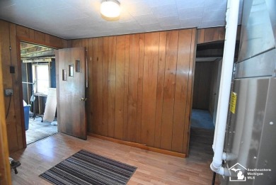 Discover the potential of this 2/3-bedroom ranch home situated on Dundee Golf Club in Michigan - for sale on GolfHomes.com, golf home, golf lot
