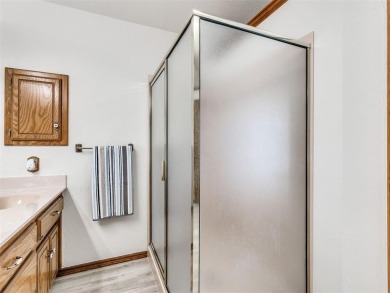 Welcome to this beautifully maintained 4-bedroom, 2-bath home on Earlywine Golf Course in Oklahoma - for sale on GolfHomes.com, golf home, golf lot