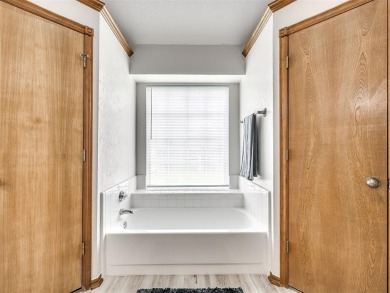 Welcome to this beautifully maintained 4-bedroom, 2-bath home on Earlywine Golf Course in Oklahoma - for sale on GolfHomes.com, golf home, golf lot