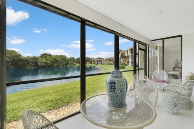 Welcome to this spacious 1st floor unit with covered parking on BallenIsles Golf and Country Club in Florida - for sale on GolfHomes.com, golf home, golf lot