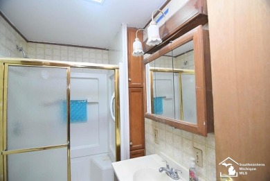 Discover the potential of this 3-bedroom ranch home situated on on Dundee Golf Club in Michigan - for sale on GolfHomes.com, golf home, golf lot