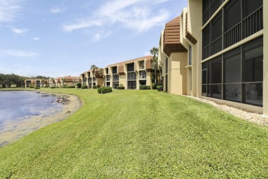 Welcome to this spacious 1st floor unit with covered parking on BallenIsles Golf and Country Club in Florida - for sale on GolfHomes.com, golf home, golf lot