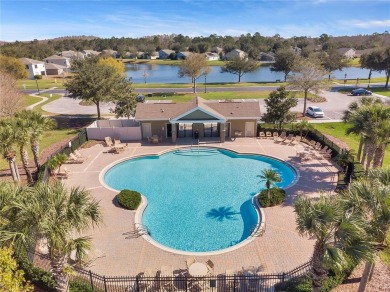 Conservation Lot. Furnished. Front Pond View. Single-story home on Meadow Oaks Golf and Country Club in Florida - for sale on GolfHomes.com, golf home, golf lot