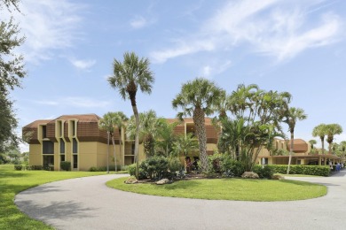 Welcome to this spacious 1st floor unit with covered parking on BallenIsles Golf and Country Club in Florida - for sale on GolfHomes.com, golf home, golf lot