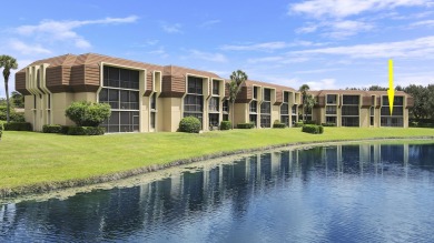 Welcome to this spacious 1st floor unit with covered parking on BallenIsles Golf and Country Club in Florida - for sale on GolfHomes.com, golf home, golf lot