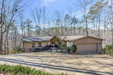 Situated on 1.92 wooded acres, this recently remodeled interior on Keowee Key Golf and Country Club in South Carolina - for sale on GolfHomes.com, golf home, golf lot