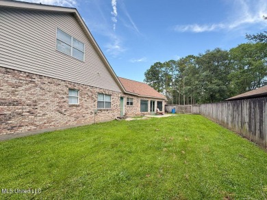 Spacious 5BR/5BA Home in Beautiful Diamondhead, MSDiscover on Diamondhead Country Club in Mississippi - for sale on GolfHomes.com, golf home, golf lot