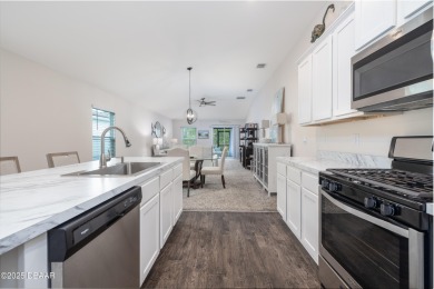 Nearly new home offering rare privacy on a quiet dead-end street on Grand Reserve Golf Course in Florida - for sale on GolfHomes.com, golf home, golf lot