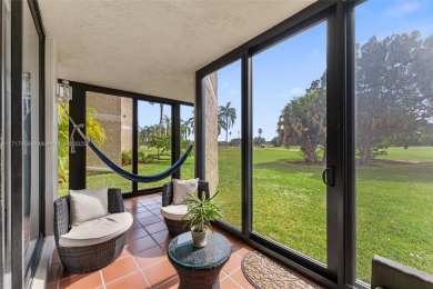 This first-floor corner unit features balcony with amazing golf on Bonaventure Country Club in Florida - for sale on GolfHomes.com, golf home, golf lot