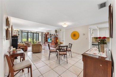 This first-floor corner unit features balcony with amazing golf on Bonaventure Country Club in Florida - for sale on GolfHomes.com, golf home, golf lot