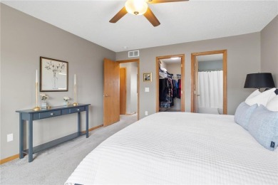 Wake up to breathtaking sunrise views over the adjacent golf on Boulder Pointe Golf Club in Minnesota - for sale on GolfHomes.com, golf home, golf lot