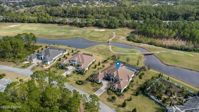 Live where every day feels like a private retreat. This former on Plantation Bay Golf and Country Club in Florida - for sale on GolfHomes.com, golf home, golf lot