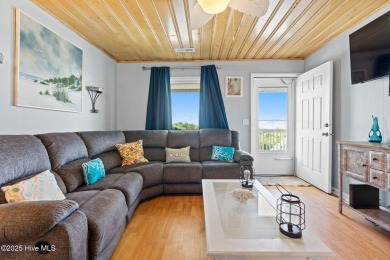 Charming ocean front cottage on the reserved island of Sunset on Oyster Bay Golf Links in North Carolina - for sale on GolfHomes.com, golf home, golf lot
