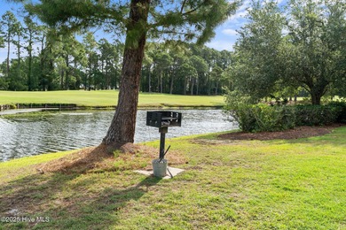 Start Your Summer in Sunset Beach! Furnished 2BR/2BA top-floor on Sandpiper Bay Golf and Country Club in North Carolina - for sale on GolfHomes.com, golf home, golf lot