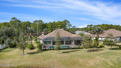 Live where every day feels like a private retreat. This former on Plantation Bay Golf and Country Club in Florida - for sale on GolfHomes.com, golf home, golf lot