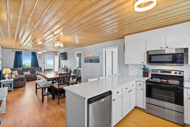 Charming ocean front cottage on the reserved island of Sunset on Oyster Bay Golf Links in North Carolina - for sale on GolfHomes.com, golf home, golf lot