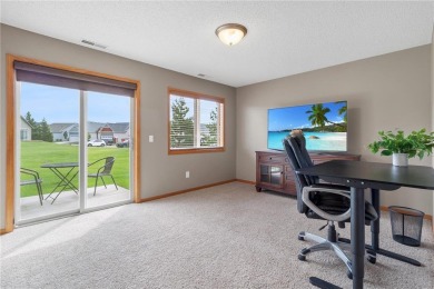 Wake up to breathtaking sunrise views over the adjacent golf on Boulder Pointe Golf Club in Minnesota - for sale on GolfHomes.com, golf home, golf lot