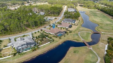Live where every day feels like a private retreat. This former on Plantation Bay Golf and Country Club in Florida - for sale on GolfHomes.com, golf home, golf lot