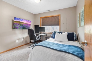 Wake up to breathtaking sunrise views over the adjacent golf on Boulder Pointe Golf Club in Minnesota - for sale on GolfHomes.com, golf home, golf lot