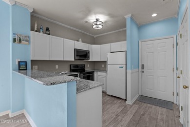 Start Your Summer in Sunset Beach! Furnished 2BR/2BA top-floor on Sandpiper Bay Golf and Country Club in North Carolina - for sale on GolfHomes.com, golf home, golf lot