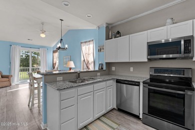 Start Your Summer in Sunset Beach! Furnished 2BR/2BA top-floor on Sandpiper Bay Golf and Country Club in North Carolina - for sale on GolfHomes.com, golf home, golf lot