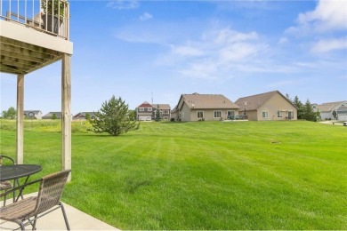 Wake up to breathtaking sunrise views over the adjacent golf on Boulder Pointe Golf Club in Minnesota - for sale on GolfHomes.com, golf home, golf lot