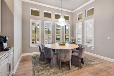 Live where every day feels like a private retreat. This former on Plantation Bay Golf and Country Club in Florida - for sale on GolfHomes.com, golf home, golf lot