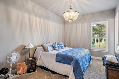 Live where every day feels like a private retreat. This former on Plantation Bay Golf and Country Club in Florida - for sale on GolfHomes.com, golf home, golf lot