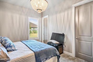 Live where every day feels like a private retreat. This former on Plantation Bay Golf and Country Club in Florida - for sale on GolfHomes.com, golf home, golf lot