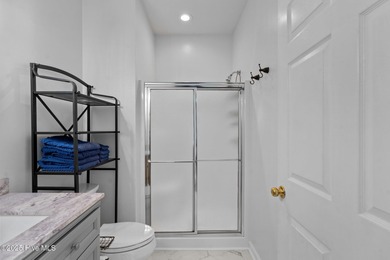 Start Your Summer in Sunset Beach! Furnished 2BR/2BA top-floor on Sandpiper Bay Golf and Country Club in North Carolina - for sale on GolfHomes.com, golf home, golf lot