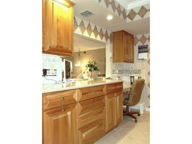 Highly sought-after *King* model with impact windows  accordion on Palm-Aire Country Club and Resort - Palms in Florida - for sale on GolfHomes.com, golf home, golf lot