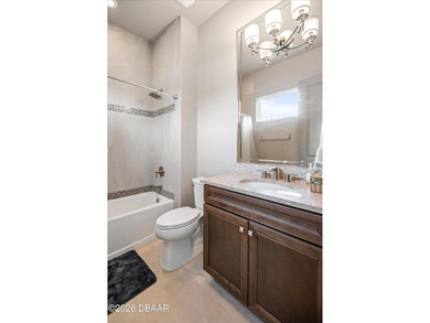 Live where every day feels like a private retreat. This former on Plantation Bay Golf and Country Club in Florida - for sale on GolfHomes.com, golf home, golf lot