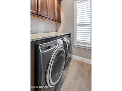 Live where every day feels like a private retreat. This former on Plantation Bay Golf and Country Club in Florida - for sale on GolfHomes.com, golf home, golf lot