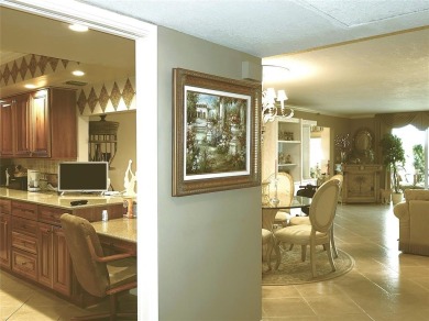 Highly sought-after *King* model with impact windows  accordion on Palm-Aire Country Club and Resort - Palms in Florida - for sale on GolfHomes.com, golf home, golf lot