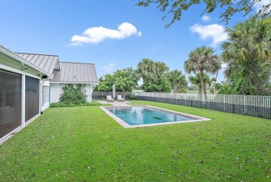 A must see ranch style home with a large loft located in the on Turtle Creek Club in Florida - for sale on GolfHomes.com, golf home, golf lot