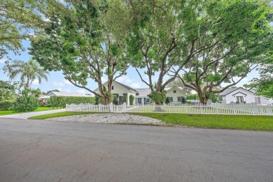 A must see ranch style home with a large loft located in the on Turtle Creek Club in Florida - for sale on GolfHomes.com, golf home, golf lot