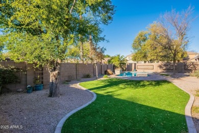 This charming single-level residence features 3 spacious on Augusta Ranch Golf Club in Arizona - for sale on GolfHomes.com, golf home, golf lot