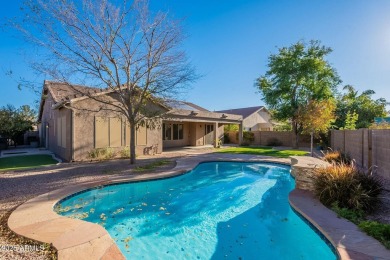 This charming single-level residence features 3 spacious on Augusta Ranch Golf Club in Arizona - for sale on GolfHomes.com, golf home, golf lot