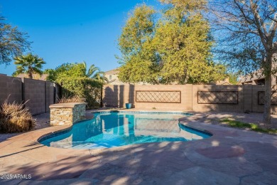 This charming single-level residence features 3 spacious on Augusta Ranch Golf Club in Arizona - for sale on GolfHomes.com, golf home, golf lot