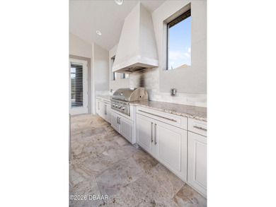 Live where every day feels like a private retreat. This former on Plantation Bay Golf and Country Club in Florida - for sale on GolfHomes.com, golf home, golf lot