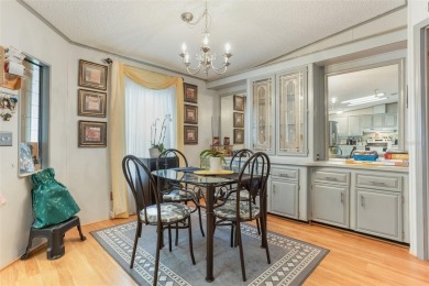 Welcome to this beautifully maintained 2-bedroom, 2-bath home on Plantation Golf Club in Florida - for sale on GolfHomes.com, golf home, golf lot