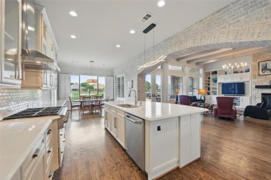 Situated directly on the 5th green, this luxury residence offers on Wildhorse Golf Club of Robson Ranch in Texas - for sale on GolfHomes.com, golf home, golf lot